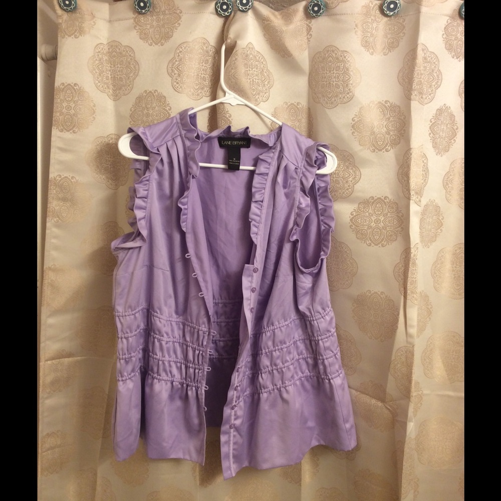 Purple sleeveless shirt.